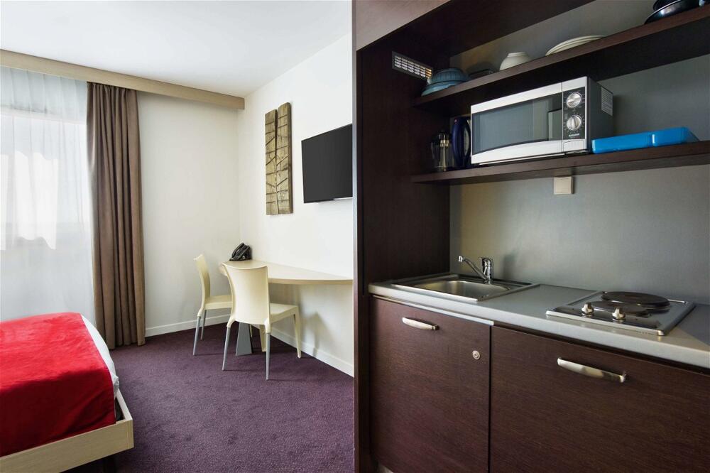 Foto de una habitación de Sure Hotel by Best Western Nantes Beaujoire