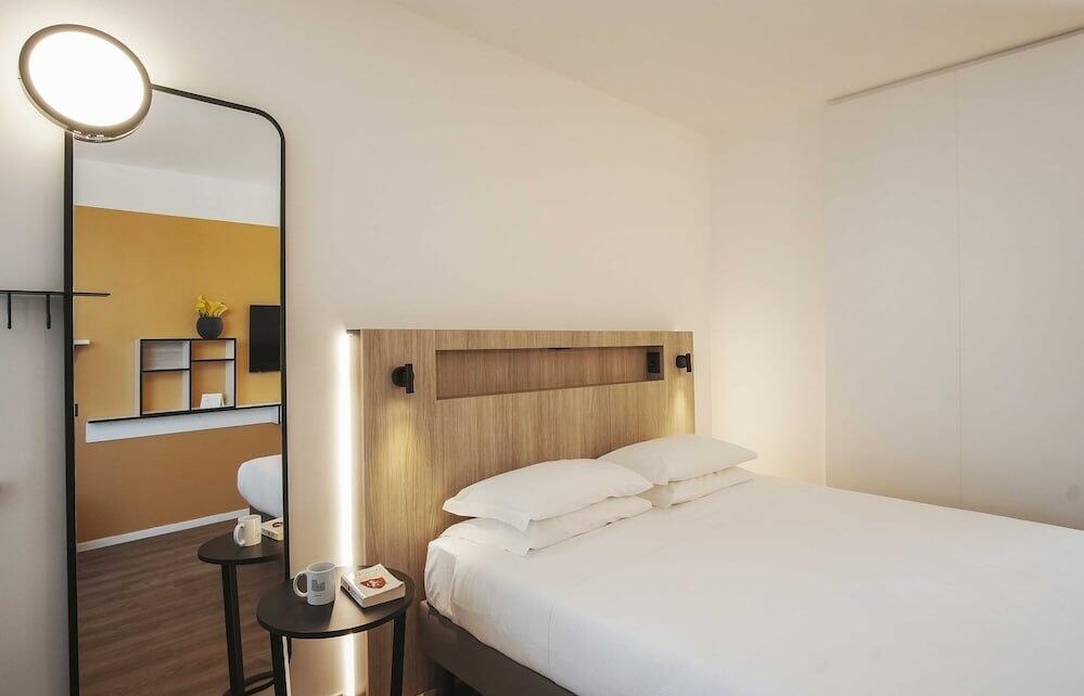 Foto de una habitación de Aparthotel Colombo Roma