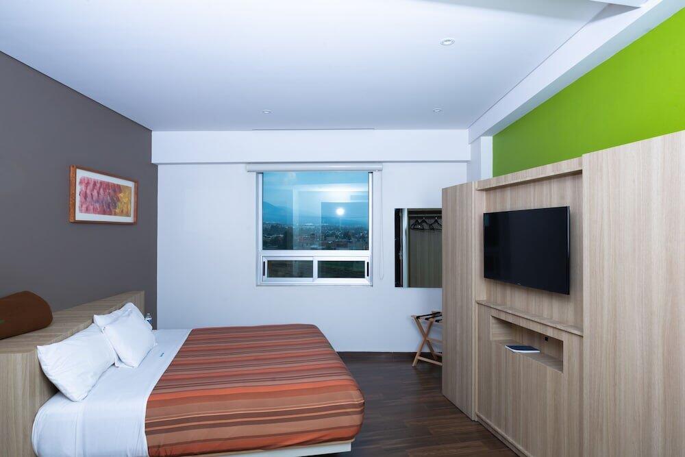 Foto de una habitación de Hotel Xcoco Inn