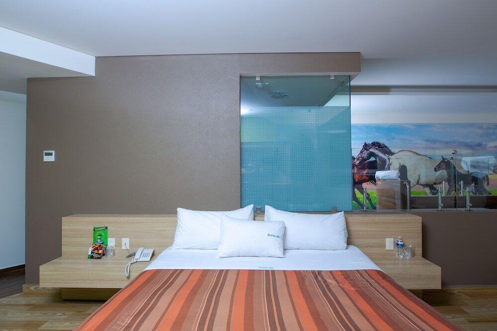Foto de una habitación de Hotel Xcoco Inn