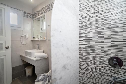 Foto del baño de Amaryllis Hotel