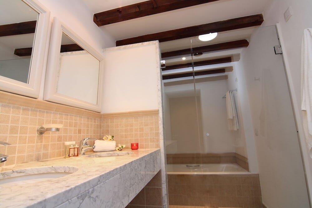 Foto del baño de Petit Hotel Algaida
