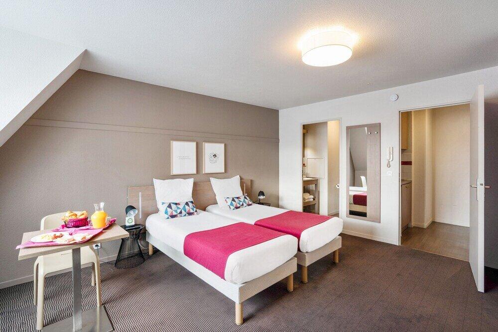 Foto de una habitación de Appart&amp;#039;City Classic Paris La Villette