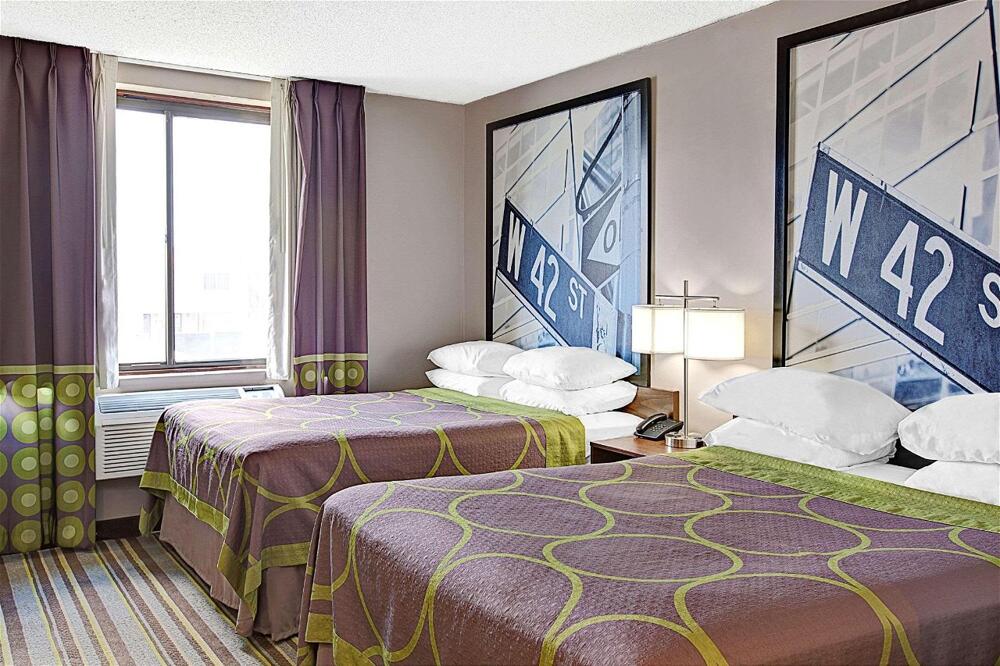 Foto de una habitación de Hotel Super 8 by Wyndham Jamaica North Conduit