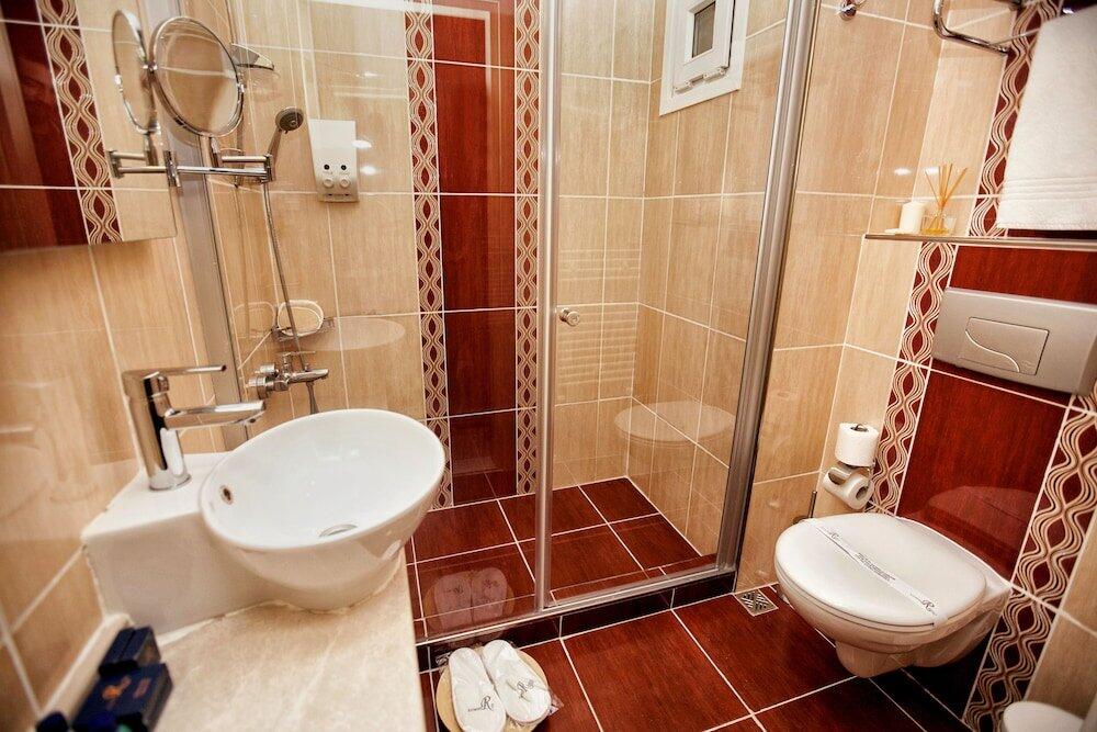 Foto del baño de Raymond Hotel