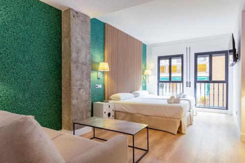 Foto de una habitación de H-A Aparthotel Hotel Quo