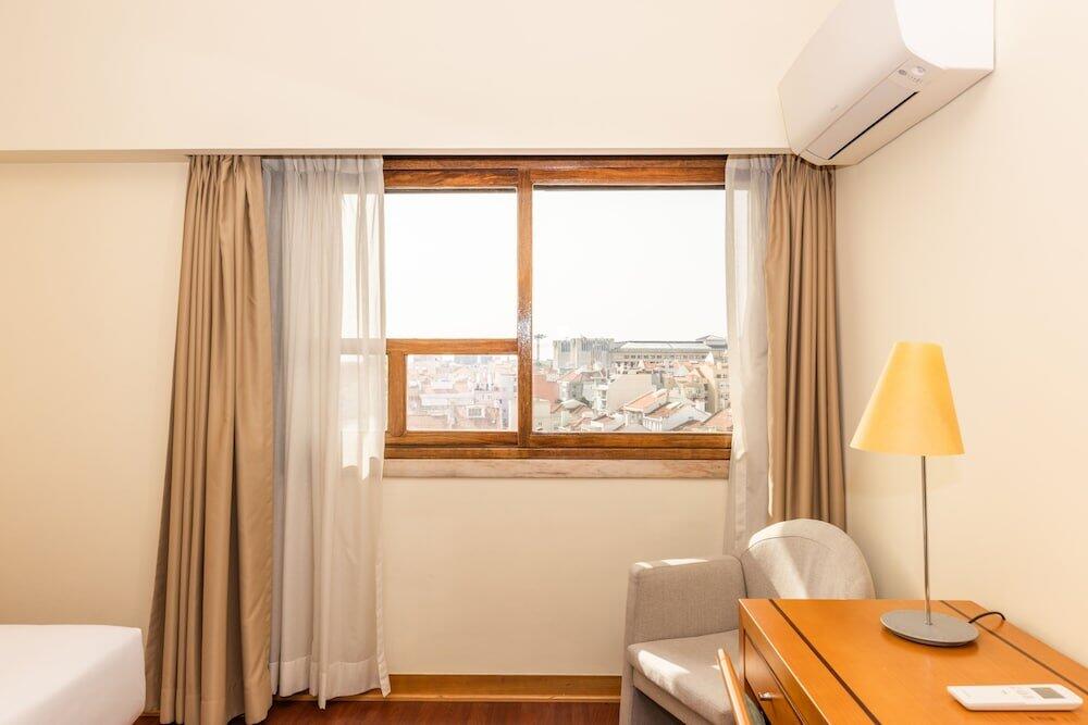 Foto de una habitación de Hotel Roma
