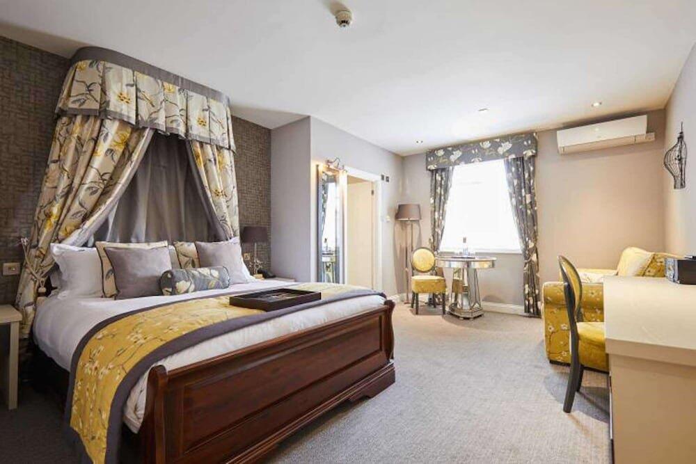 Foto de una habitación de Woughton House Hotel