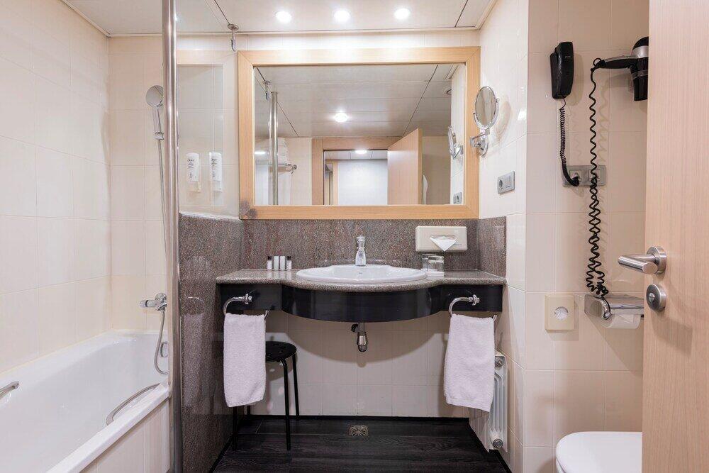Foto del baño de Suites Plaza Hotel &amp;amp; Wellness