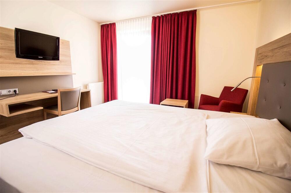 Foto de una habitación de Arvena Park Hotel