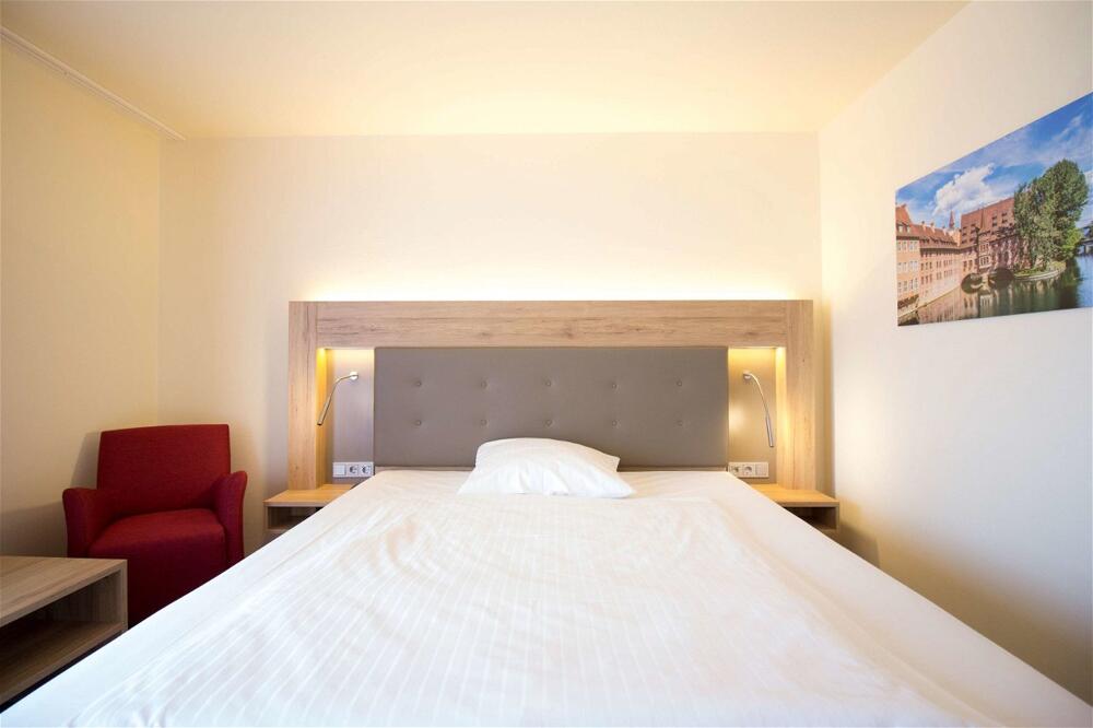 Foto de una habitación de Arvena Park Hotel