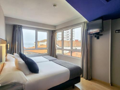 Foto de una habitación de Hotel Faranda Express Pathos Gijón