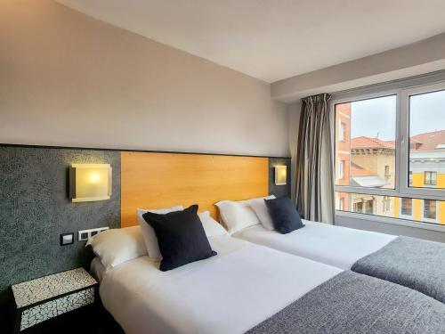 Foto de una habitación de Hotel Faranda Express Pathos Gijón