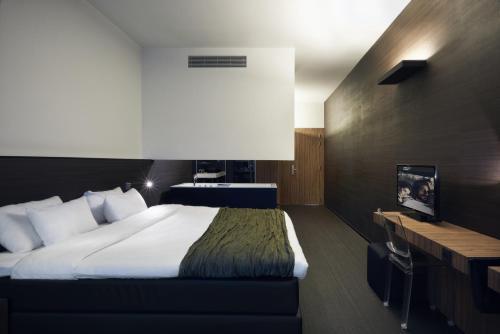Foto de una habitación de Carbon Hotel