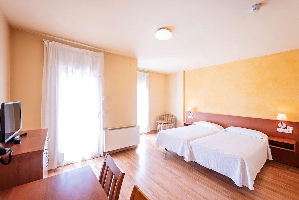 Foto de una habitación de Hotel La Perla D&amp;#039;Olot