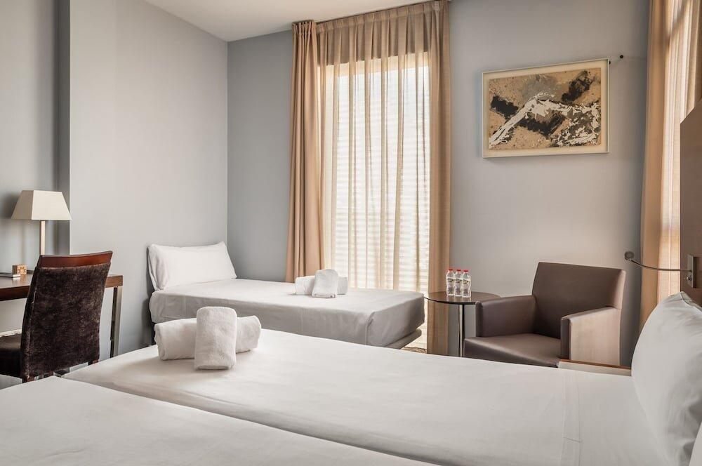 Foto de una habitación de Hotel Madanis