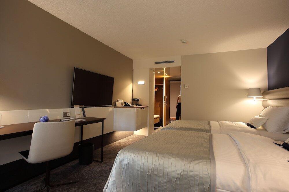 Foto de una habitación de Mövenpick Hotel Lausanne