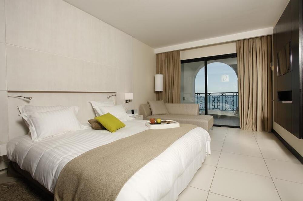 Foto de una habitación de Hotel Dar El Marsa