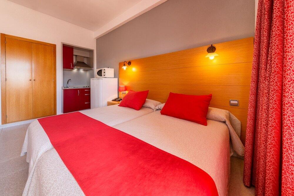 Foto de una habitación de Apartamentos Isla del Sol