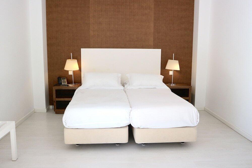 Foto de una habitación de Amazonia Estoril Hotel