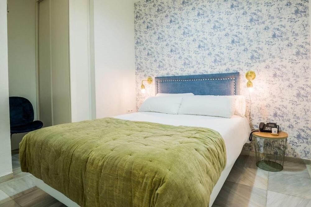 Foto de una habitación de Jardín de la Alameda Hostal Boutique