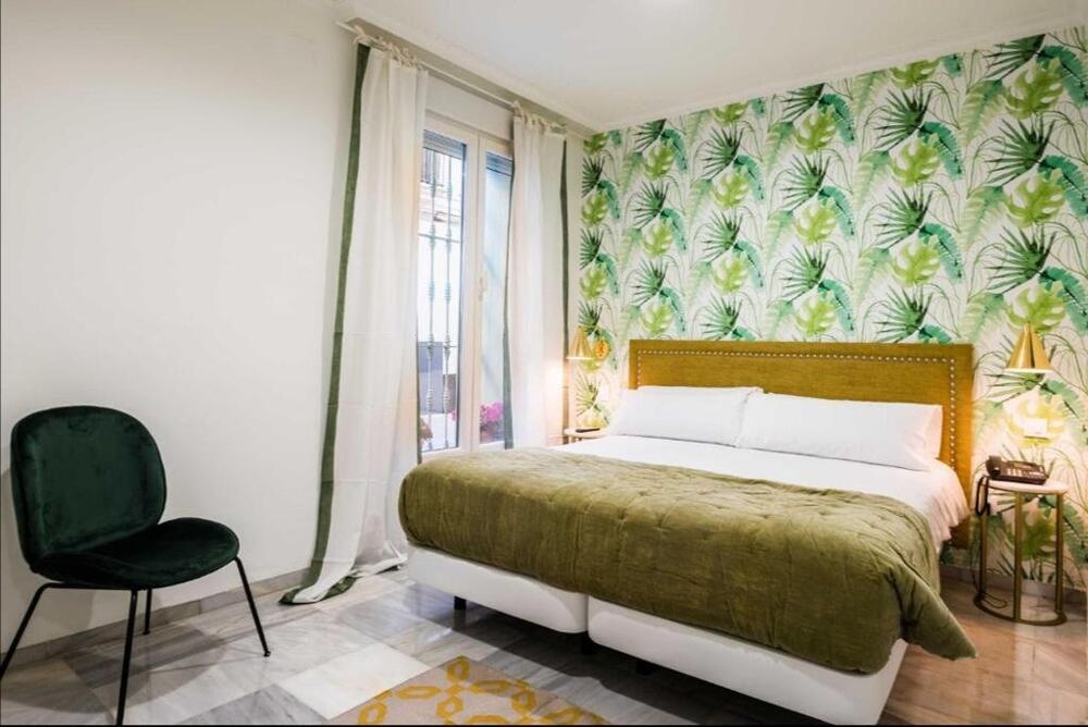 Foto de una habitación de Jardín de la Alameda Hostal Boutique