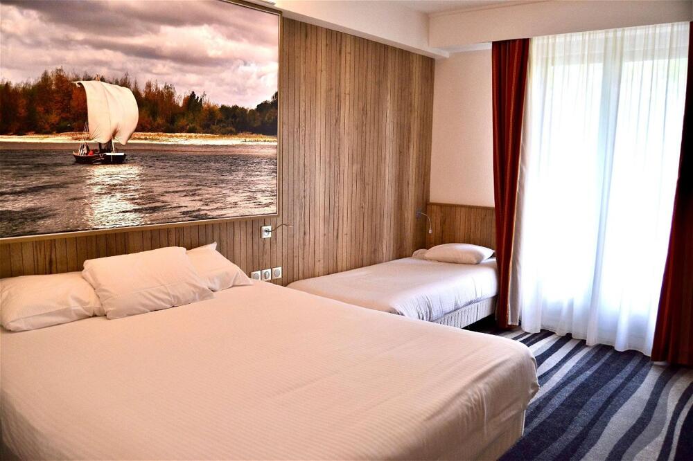 Foto de una habitación de Kyriad Hotel Tours Centre