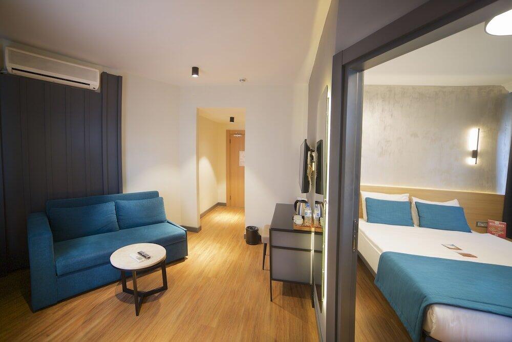 Foto de una habitación de Barin Hotel