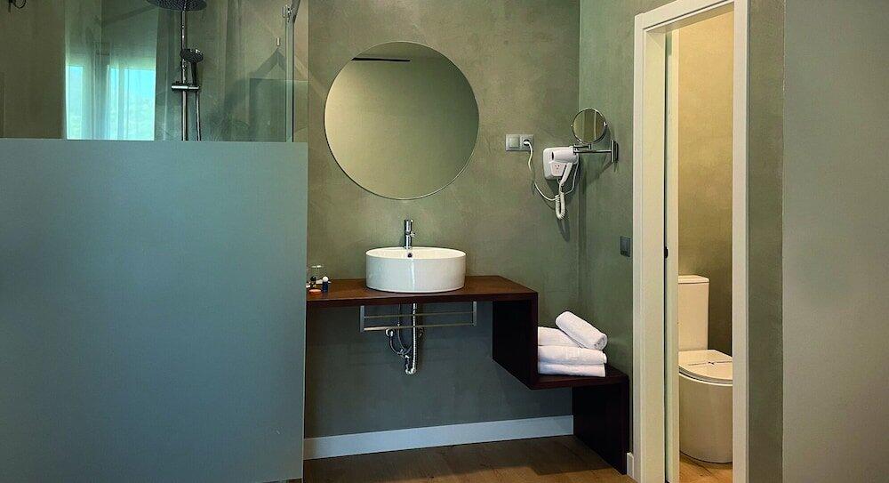 Foto del baño de Hotel Añoreta Suites