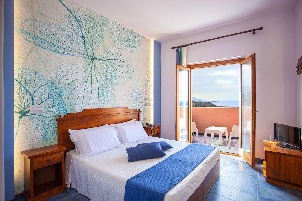 Foto de una habitación de Hotel Village Suvaki