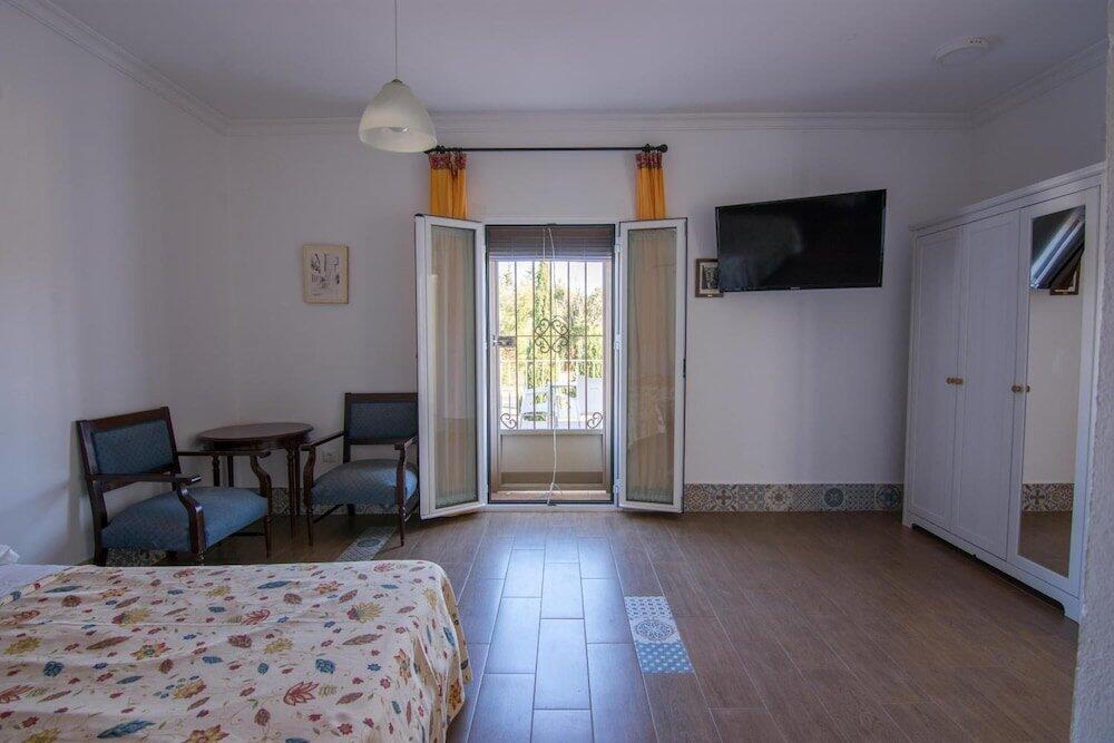 Foto de una habitación de Hotel Rural El Cortijo
