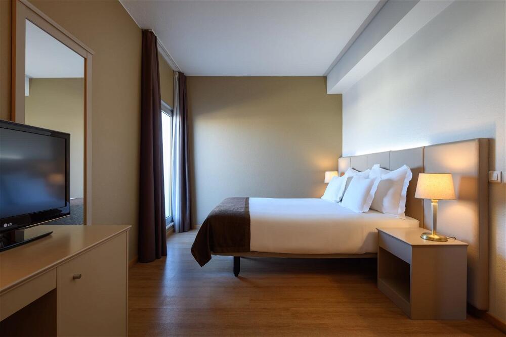 Foto de una habitación de TRYP by Wyndham Porto Centro Hotel