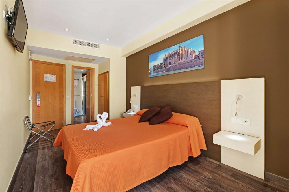 Foto de una habitación de Hotel Abelux