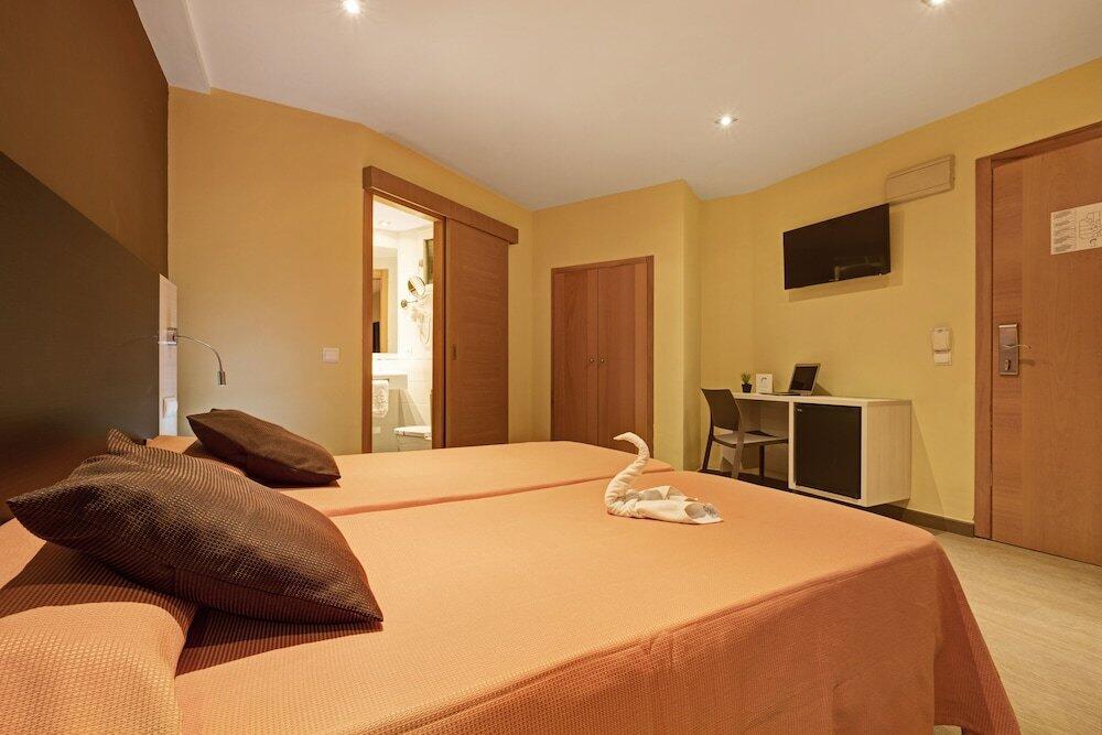Foto de una habitación de Hotel Abelux
