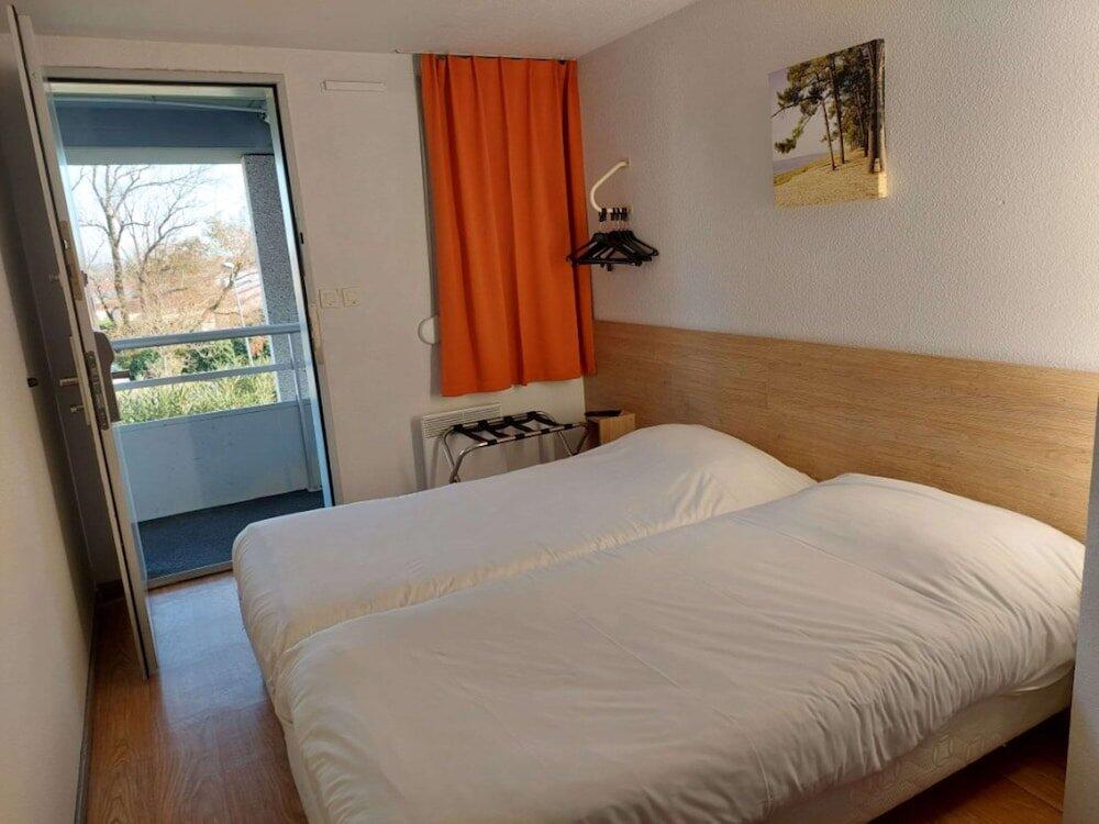 Foto de una habitación de The Originals Access, Hôtel Recouvrance Saintes Ouest (P&amp;#039;tit Dej-Hotel)