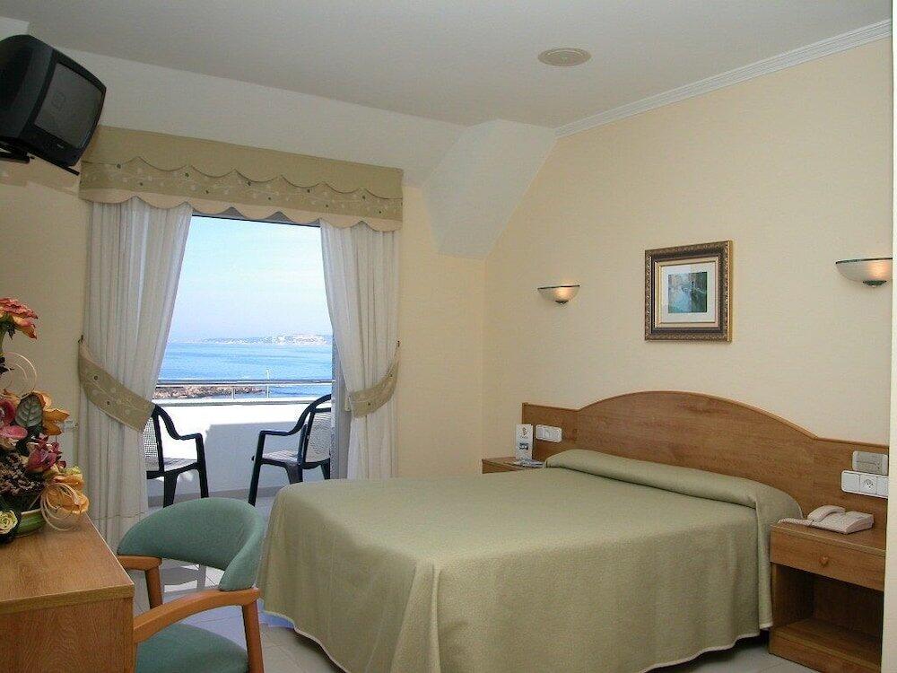 Foto de una habitación de Hotel Piñeiro 2 Estrellas Superior