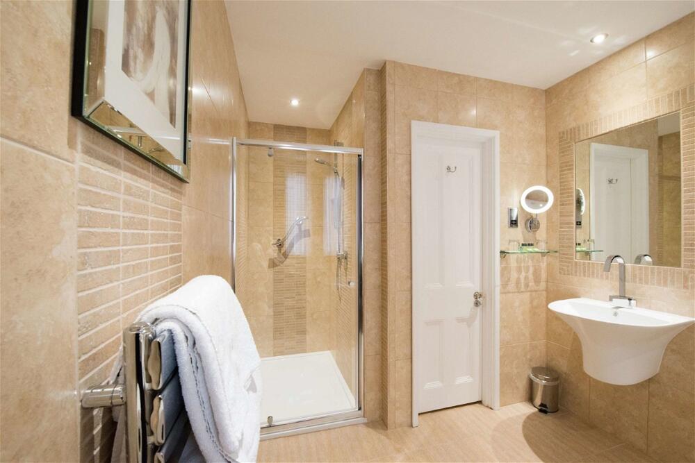 Foto del baño de Best Western Plus Burlington Hotel