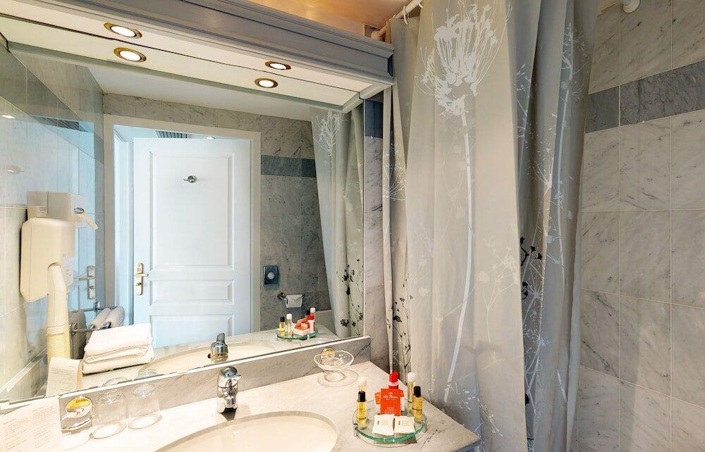 Foto del baño de Sun Riviera Hotel