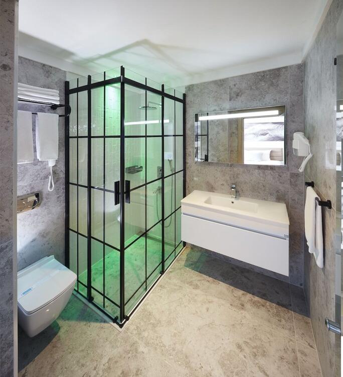 Foto del baño de Hotel Lalila Blue Suites