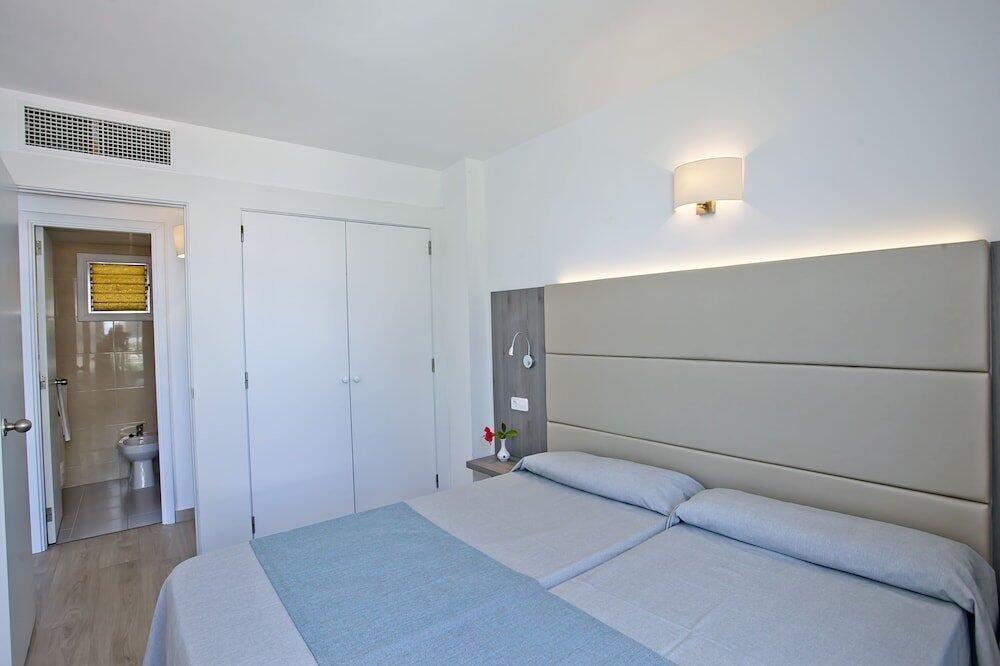 Foto de una habitación de Aparthotel Playa Dorada