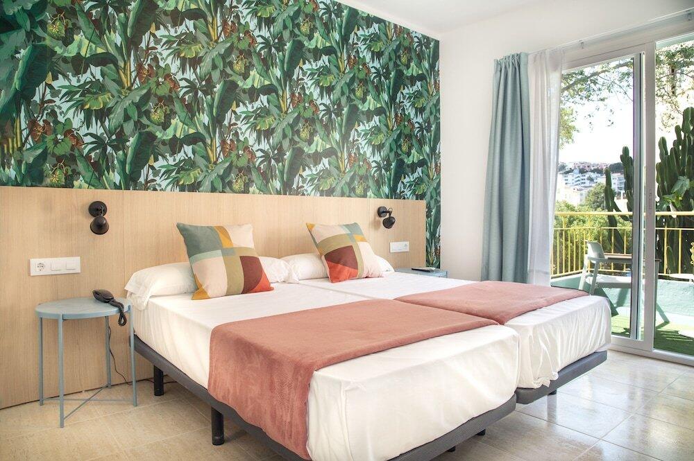 Foto de una habitación de Hotel 4U Miranda