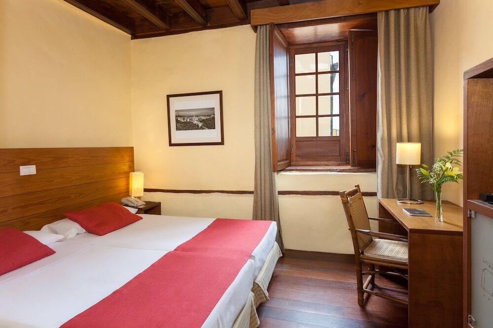 Foto de una habitación de Hotel LIVVO La Quinta Roja
