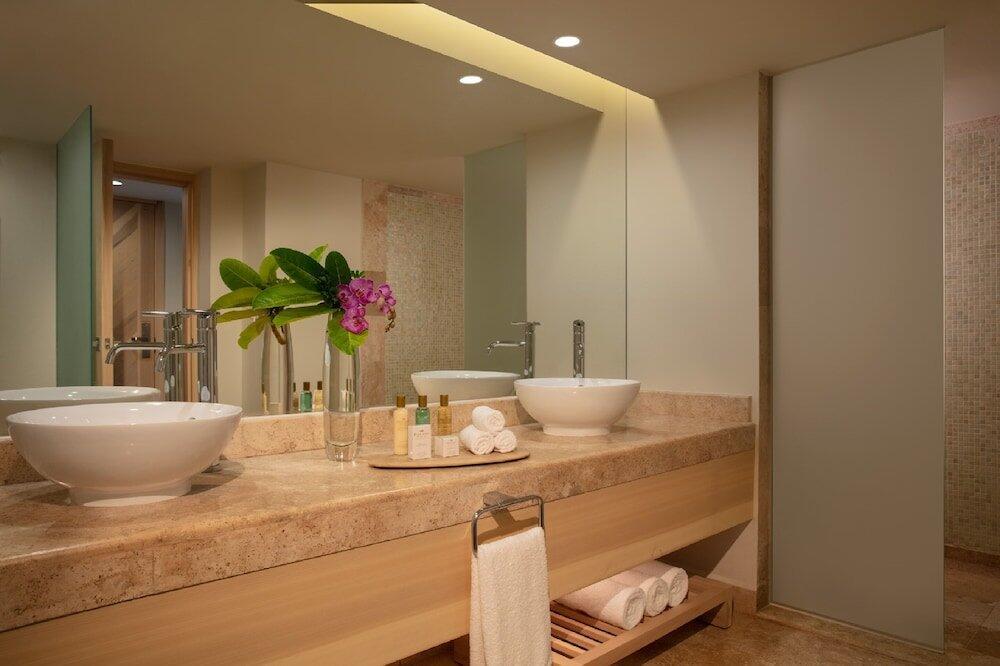 Foto del baño de Complejo Dreams Aventuras Riviera Maya - All Inclusive