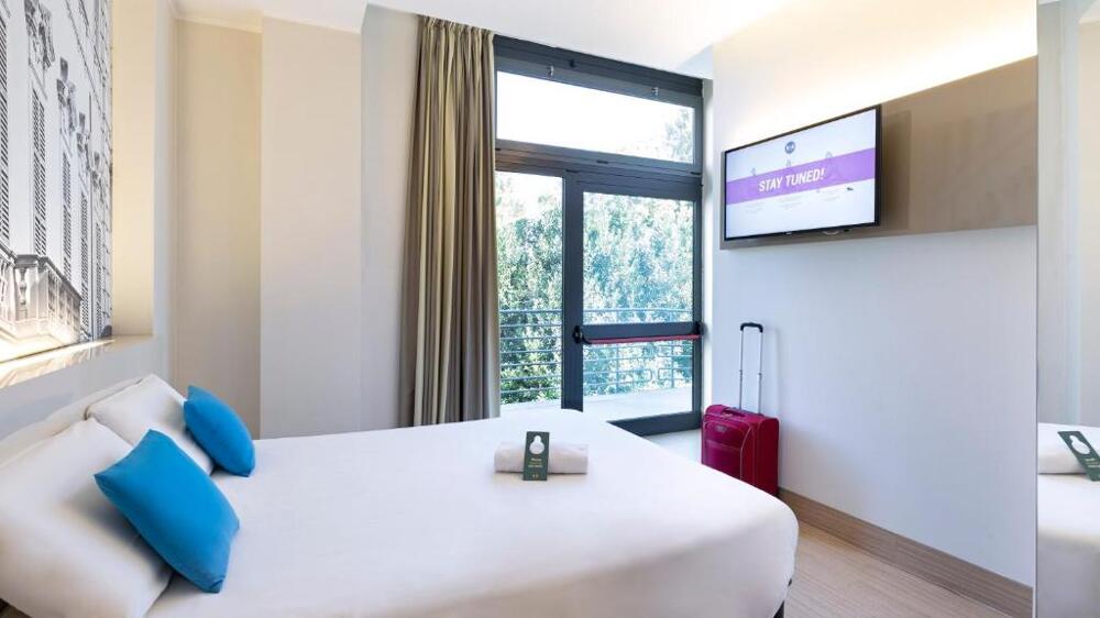 Foto de una habitación de B&amp;amp;B Hotel Faenza