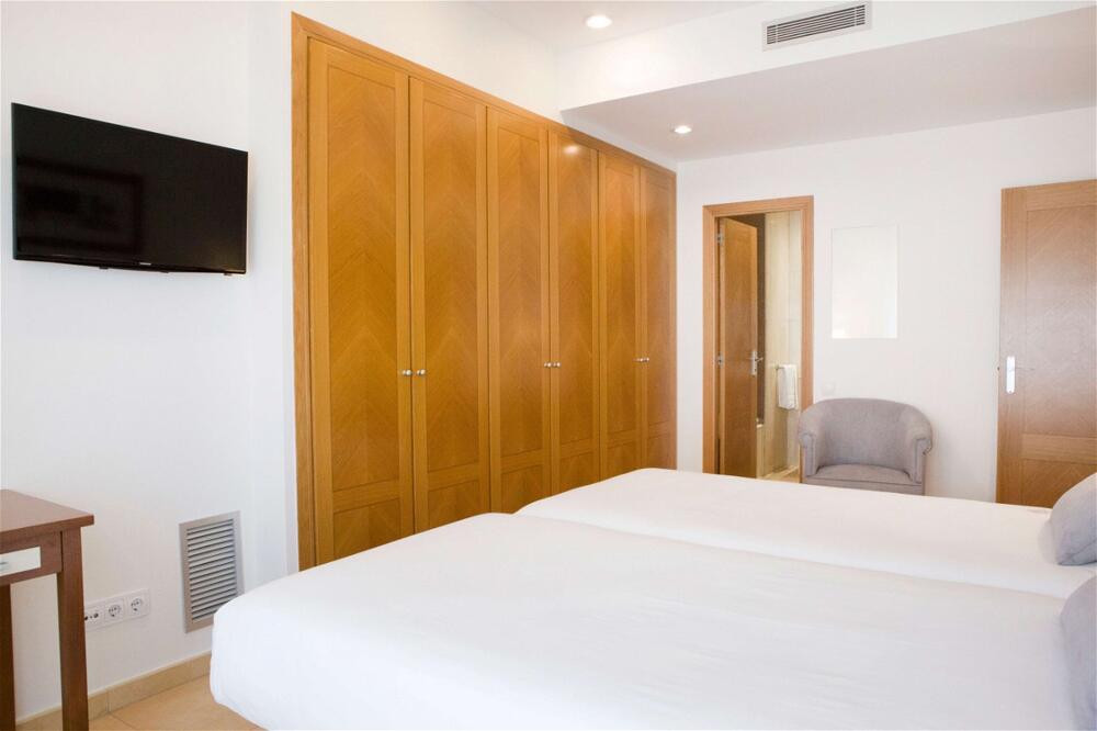 Foto de una habitación de Aparthotel Albufera