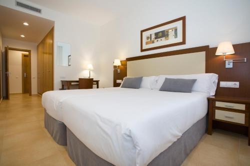 Foto de una habitación de Aparthotel Albufera