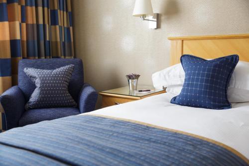 Foto de una habitación de Pomme d&amp;#039;Or Hotel
