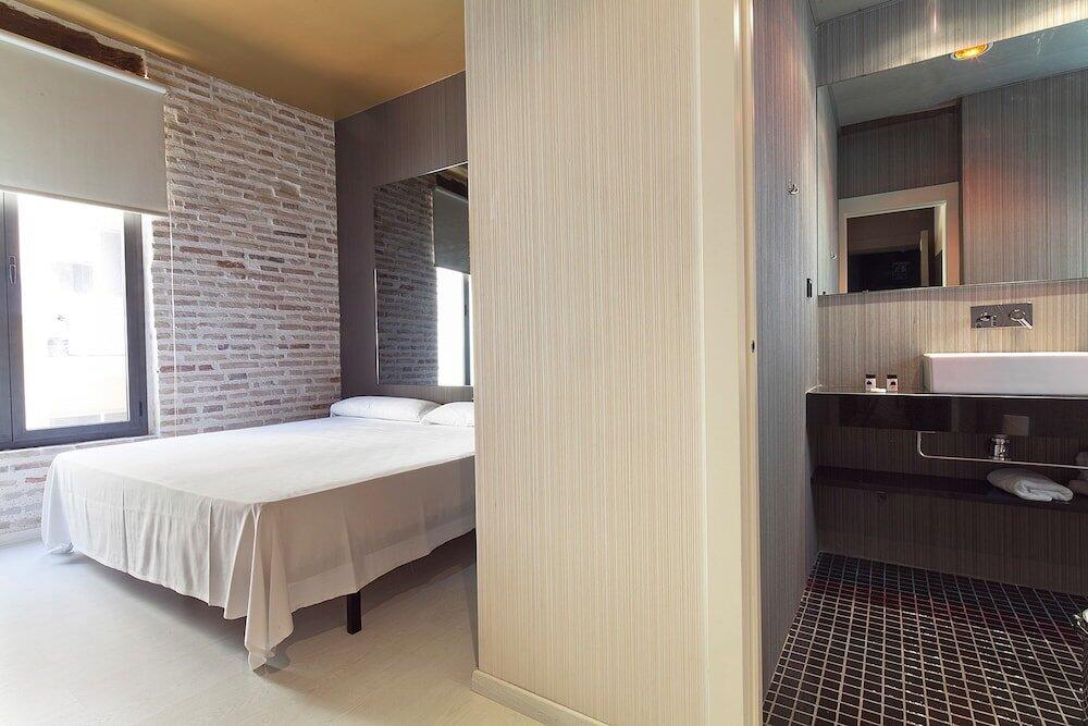 Foto de una habitación de Hotel Cosy Rooms Embajador