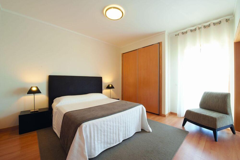 Foto de una habitación de Apartamentos Real Marina Residence