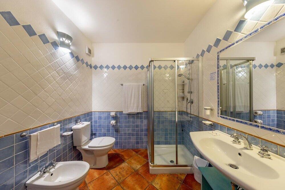 Foto del baño de Hotel LH Pedraladda Resort